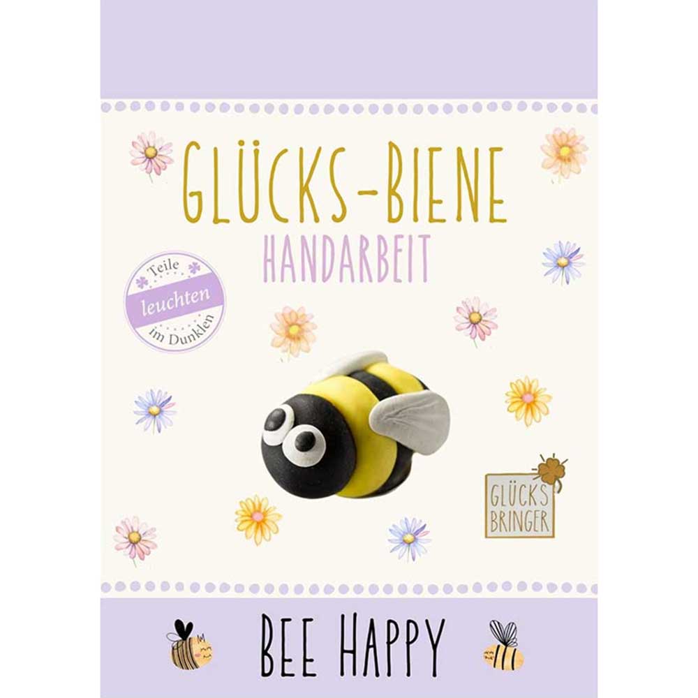 Buchcover mit einer Glücks-Biene aus buntem Material. Titel: Bee Happy, handgefertigt.