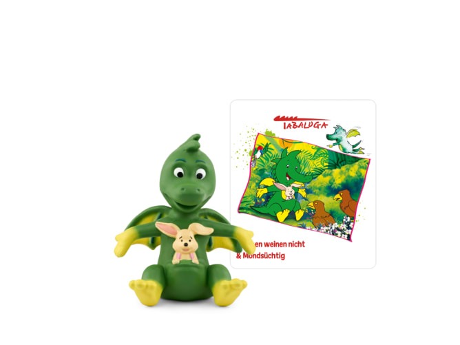 Grüner Drache mit einem kleinen Hasen in den Händen. Im Hintergrund eine bunte Buchillustration.