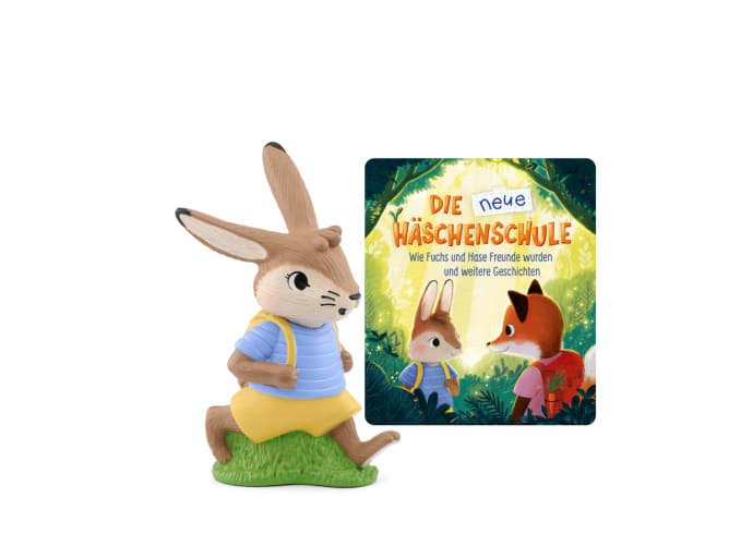 Figur eines Hasen in blauer Kleidung. Dazu ein Buch mit dem Titel 'DIE neue Häsenschule'.