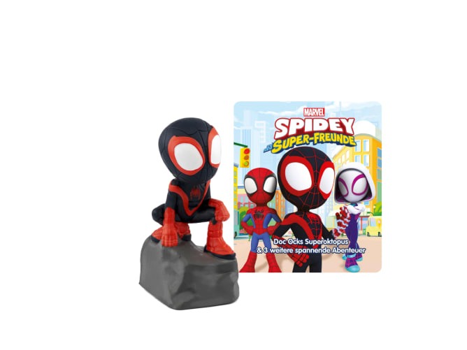 Figur von Spider-Man in schwarzem und rotem Anzug, sitzt auf einem grauen Felsen. Im Hintergrund ein Buchcover mit dem Titel 'Marvel Spidey Super-Freunde'.