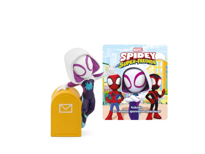 Figur mit weißer Kapuze und lila Akzenten. Steht neben einem gelben Briefkasten. Im Hintergrund ein Buchcover mit dem Titel 'Marvel Spidey Super-Freunde'.