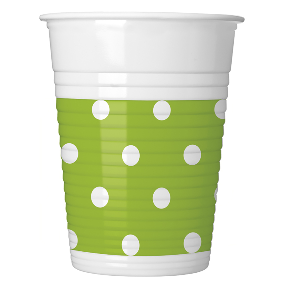 Grüner Becher mit weißen Punkten. Der Becher hat eine gerippte Oberfläche.