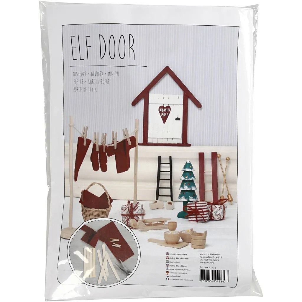 Miniatur Elfentür mit rotem Dach. Dekorative Elemente wie ein kleiner Weihnachtsbaum, Geschenke und eine Leiter. Verpackung zeigt die Tür und Zubehör.
