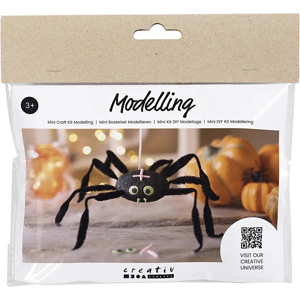 Bastelset zur Modellierung einer Spinne. Enthält schwarze und grüne Teile.