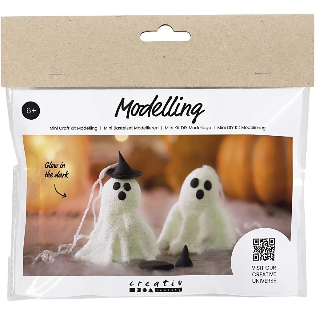 Bastelset zur Modellierung von zwei Geistern. Die Geister leuchten im Dunkeln und tragen kleine Hüte.