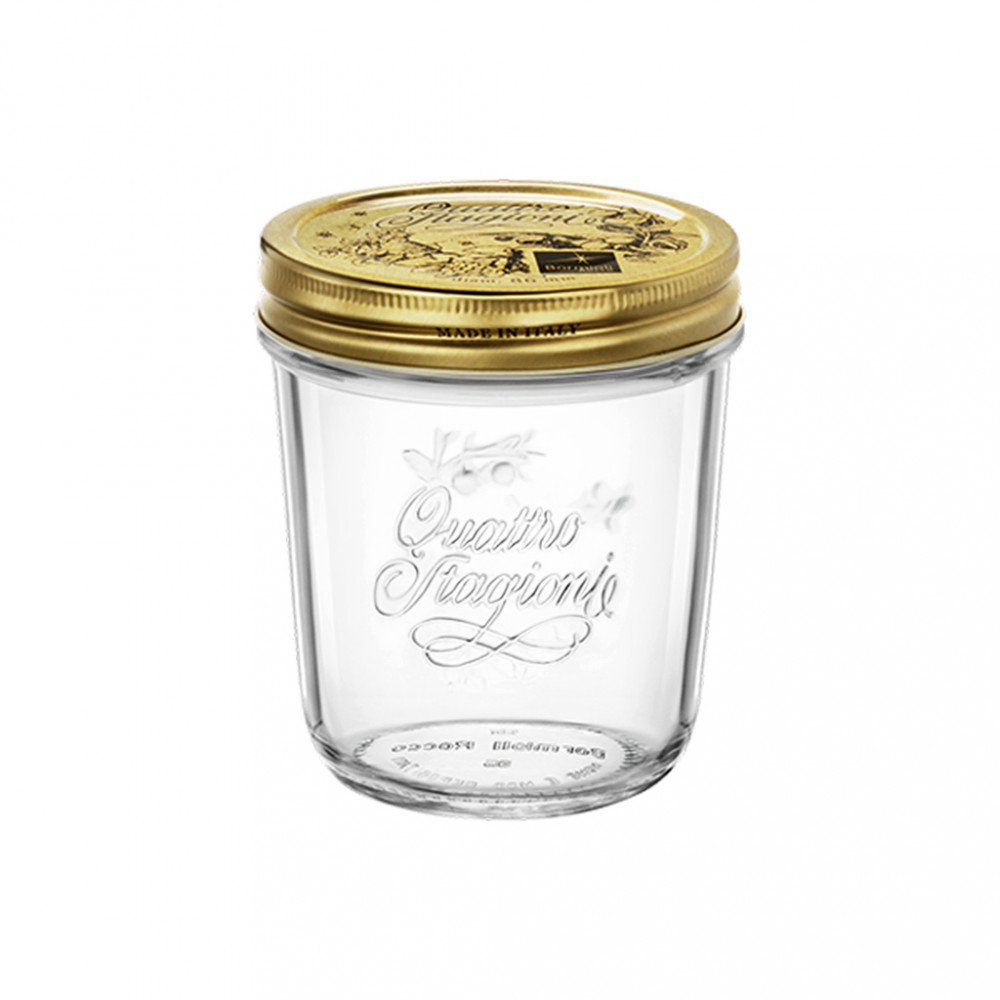 Glasgefäß mit goldenem Schraubdeckel. Beschriftung 'Quattro Stagioni'. Klare, transparente Farbe.