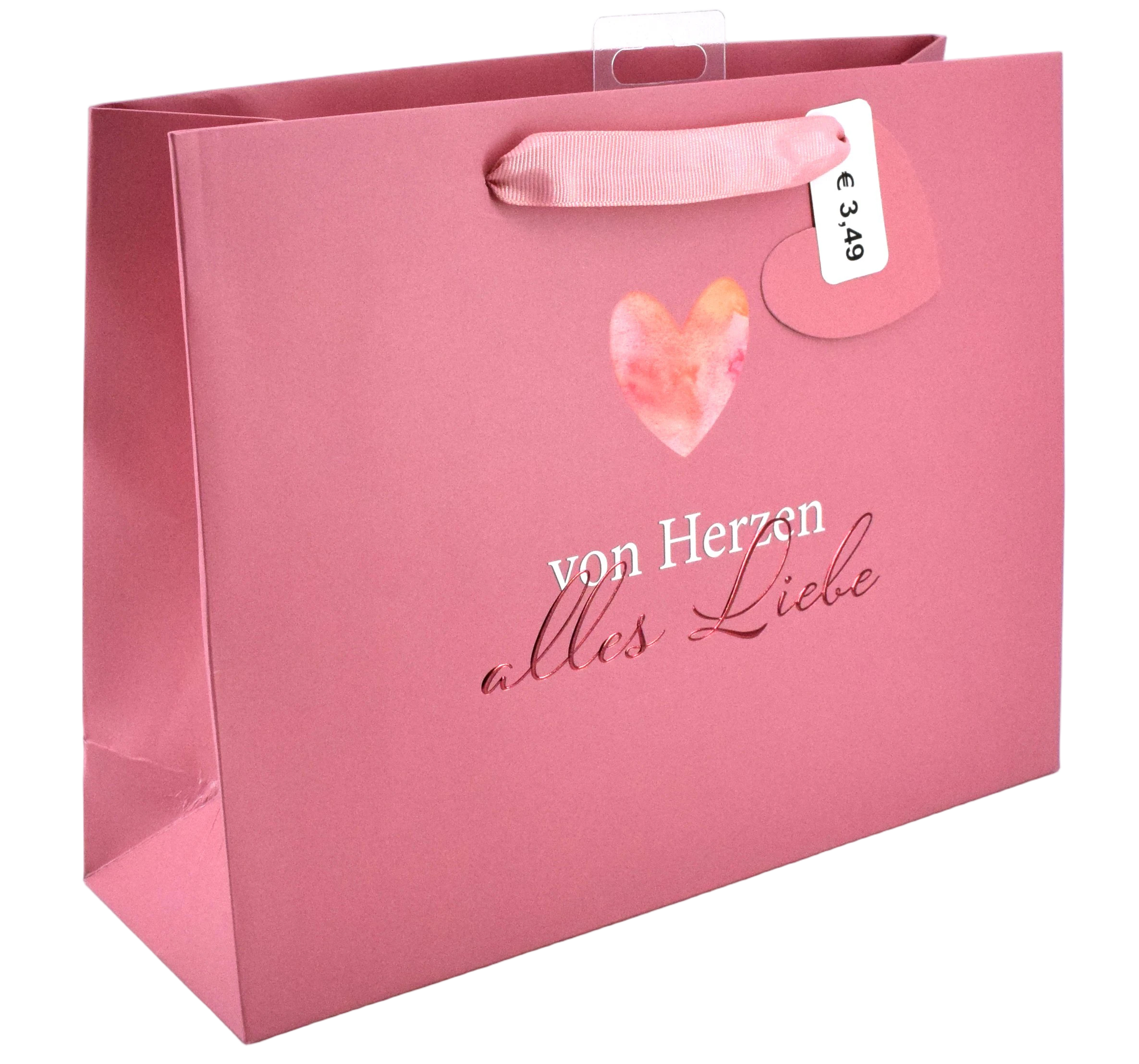 Rosa Geschenktüte mit Herzmotiv. Aufdruck mit dem Text 'von Herzen alles Liebe' und Preisetikett.