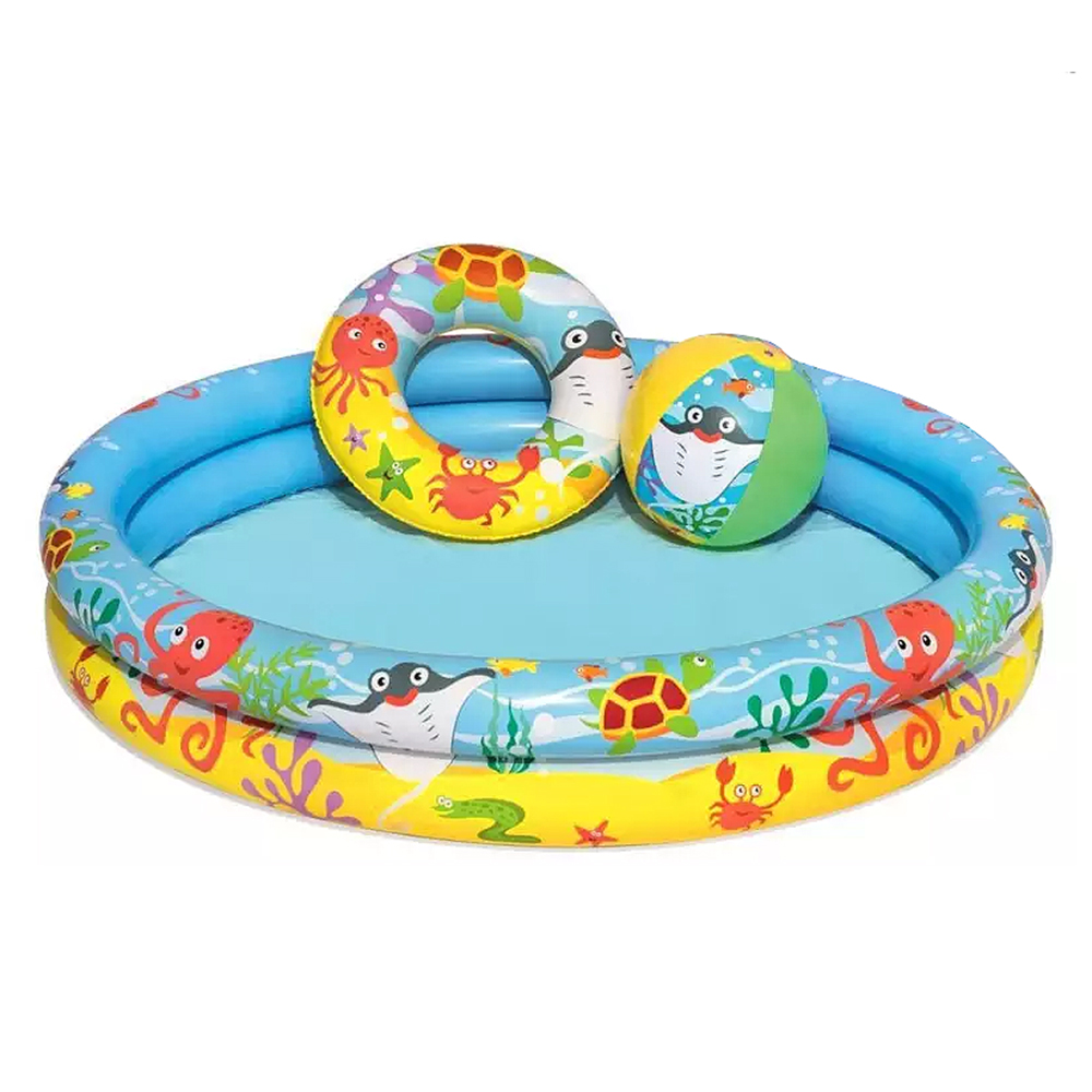 Aufblasbares Planschbecken mit bunten Meeresmotiven. Enthält einen Schwimmring und einen Ball.