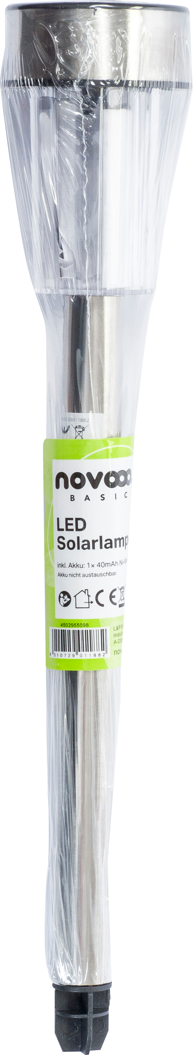LED-Solarlampe in transparentem Plastik verpackt. Metallischer Kopf und schwarzer Sockel.