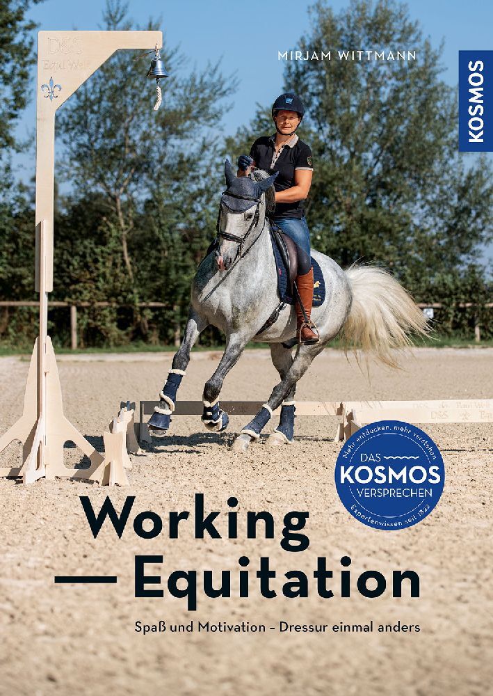 Buchcover mit dem Titel 'Working - Equitation'. Eine Reiterin auf einem grauen Pferd in einer Reitarena.